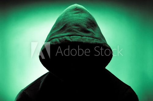 Man wearing hood with face in shadow  Ludzie Plakat