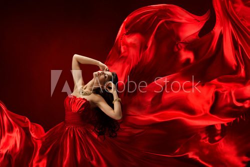 Woman in red waving beautiful dress with flying fabric  Ludzie Plakat
