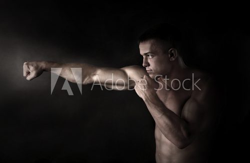 Boxer fighter on black background  Ludzie Plakat