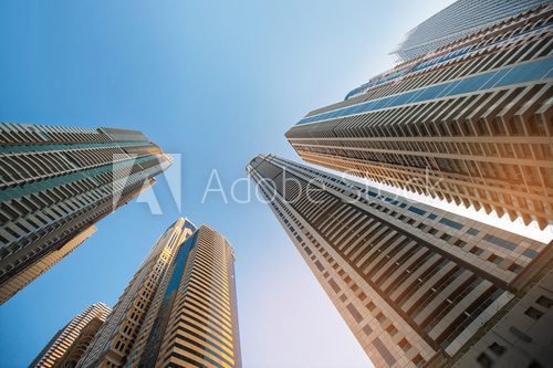 skyscraper against sky ; building glass background  Architektura Plakat