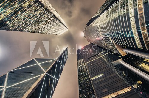 Upward view of Hong Kong Central skyscrapers at night  Architektura Plakat