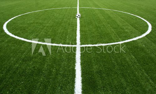 soccer ball on start kick of game  Stadion Fototapeta
