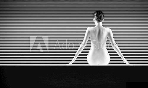 black and white artistic nude; a back silhouette shot on striped  Czarno Białe Obraz