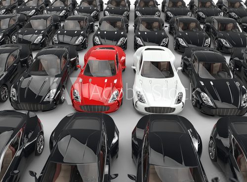 Stand out red and white cars among many black cars  Pojazdy Obraz