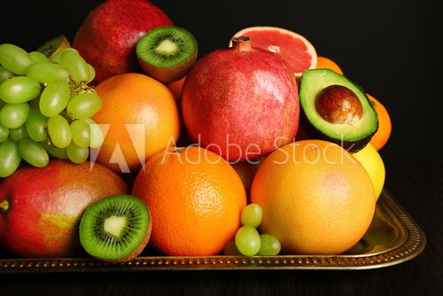 Assortment of fruits on table, close-up  Obrazy do Kuchni  Obraz