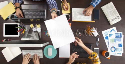 Business People Working on an Office Desk Plakaty do Biura Plakat