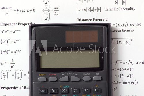 Calculate the maths / An image showing the concept of learning and education with a calculator Plakaty do Biura Plakat
