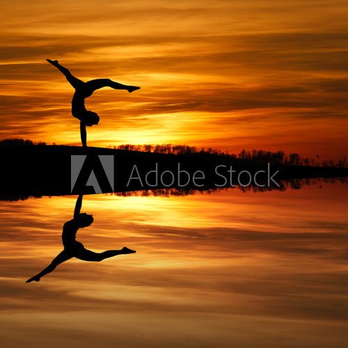 silhouette of female gymnast doing a handstand in sunset  Sport Plakat