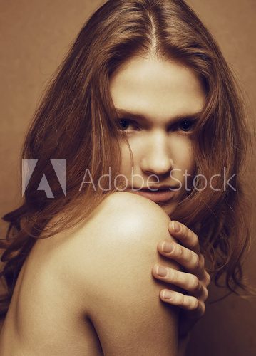 Emotive vintage portrait of a young beautiful red-haired girl  Fototapety Sepia Fototapeta