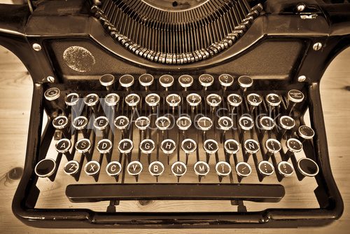 Antique typewriter on sepia  Fototapety Sepia Fototapeta