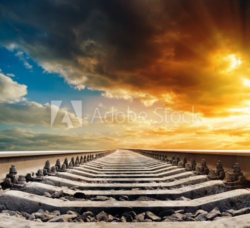railway to horizon under sunset  Zachód Słońca Fototapeta