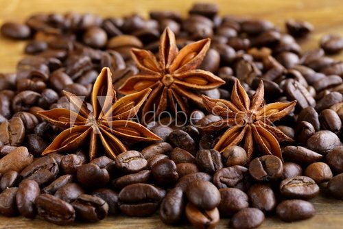 macro shot star anise on a coffee background  Kawa Fototapeta