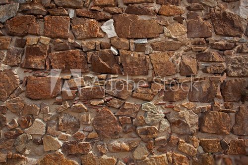 Ancient wall made of many bricks  Mur Fototapeta