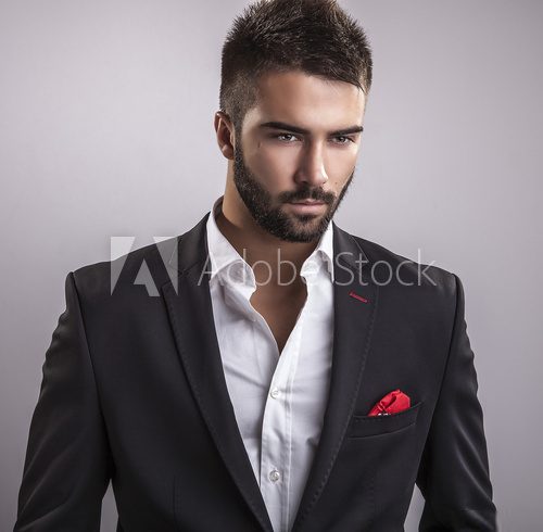 Elegant young handsome man. Studio fashion portrait.  Obrazy do Salonu Fryzjerskiego Obraz