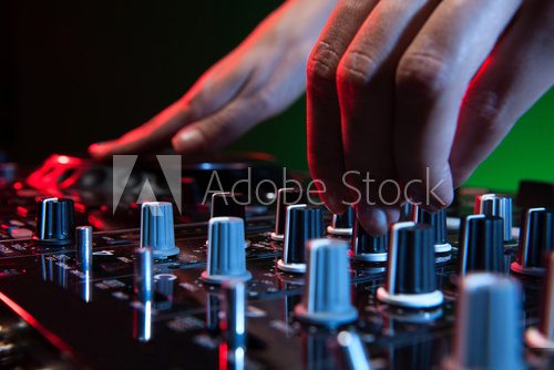 DJ at work. Close-up of DJ hands making music  Muzyka Obraz
