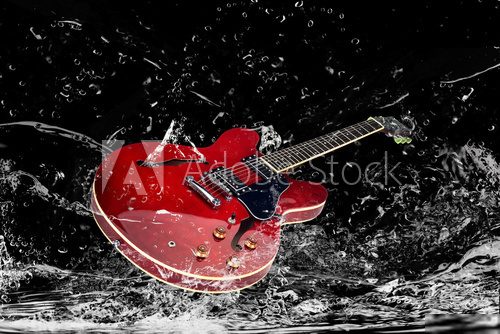 E-Gitarre mit Wasserspritzern  Muzyka Obraz