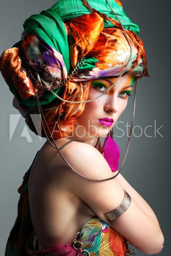 photo of redheaded girl in a head-dress from the coloured fabric  Pin-up Obraz