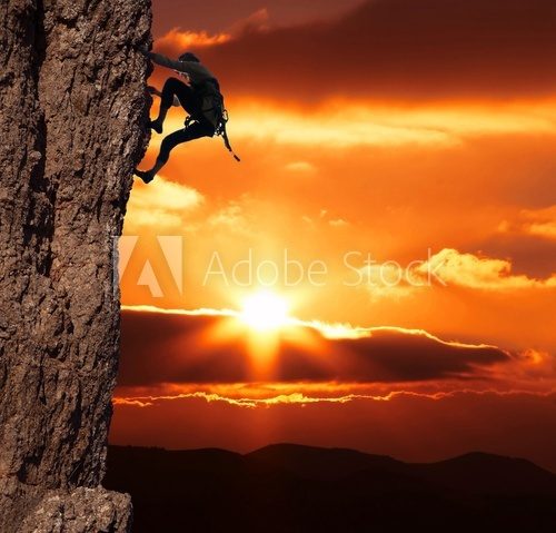climber on sanset  Sport Fototapeta