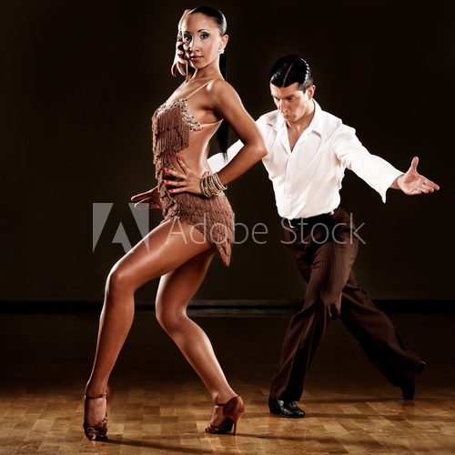latino dance couple in action  Fototapety do Szkoły Tańca Fototapeta