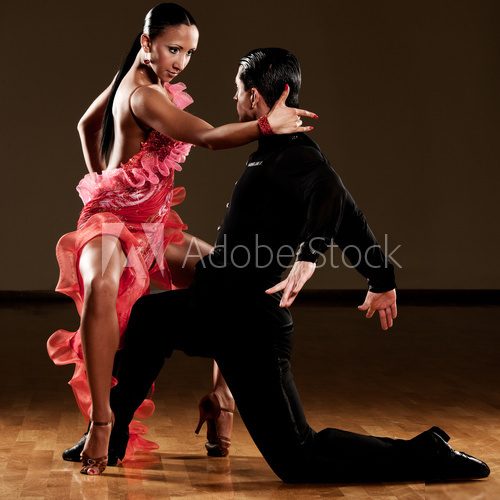 latino dance couple in action  Fototapety do Szkoły Tańca Fototapeta