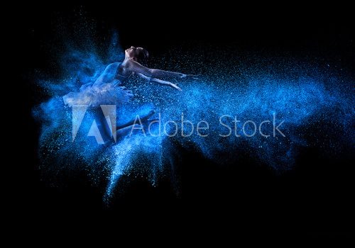 Young beautiful dancer jumping into blue powder cloud  Fototapety do Szkoły Tańca Fototapeta