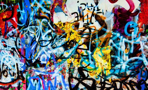 Abstrakcyjne graffiti w feerii barw na miejskiej ścianie Fototapety Graffiti Fototapeta