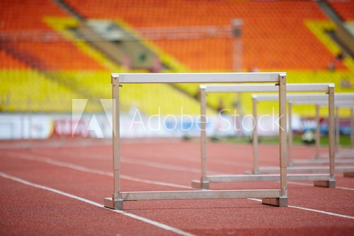 Hurdles on race tracks for obstacle race  Stadion Fototapeta