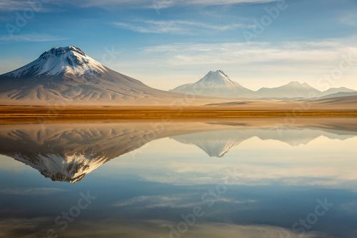Idyllic Lake Lejia reflection and volcanic landscape in Atacama desert, Chile Fototapety do Salonu Fototapeta