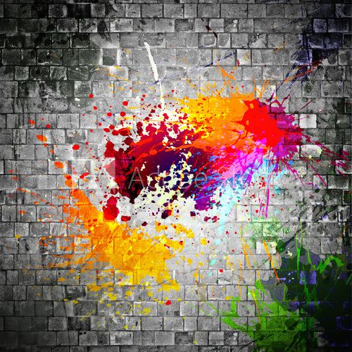 Kolorowe rozpryski farby na tle szarej ceglanej ściany Fototapety Graffiti Fototapeta