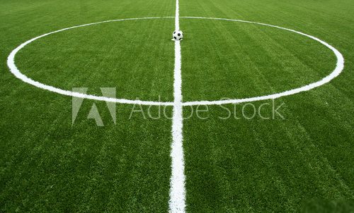 Piłkarska murawa z centralnym punktem boiska Stadion Fototapeta