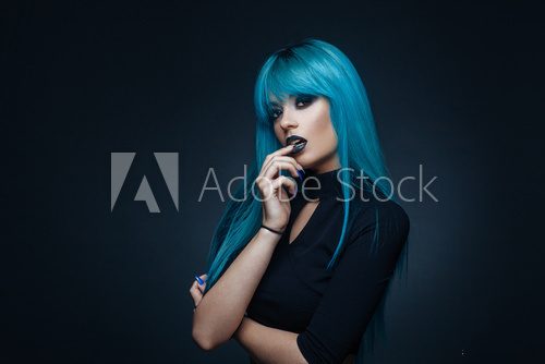 Portrait of a young woman with a cyan color hair Fototapety do Salonu Fryzjerskiego Fototapeta