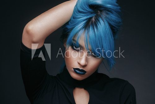 Portrait of a young woman with blue color hair Fototapety do Salonu Fryzjerskiego Fototapeta