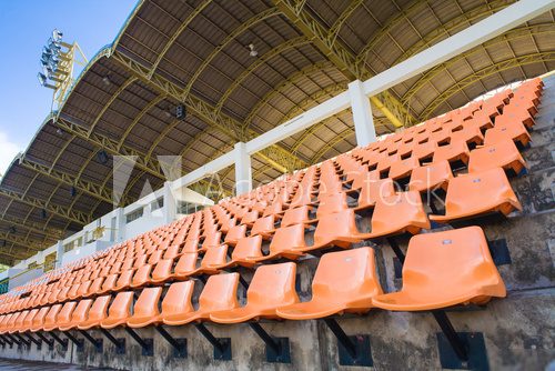 Stadium Orange Chair with roof and blue sky  Stadion Fototapeta