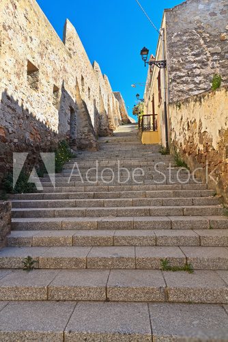 stairway and ancient walls in Carloforte  Schody Fototapeta