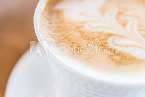 Zbliżenie na aromatyczne latte art Fototapety do Kawiarni Fototapeta