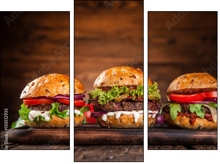 Close-up of home made burgers - Obraz trzyczęściowy, Tryptyk