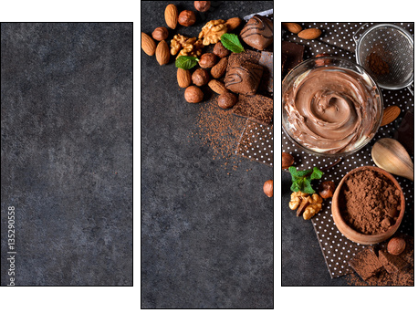 Black food background with cocoa, nuts and chocolate paste.  - Obraz trzyczęściowy, Tryptyk