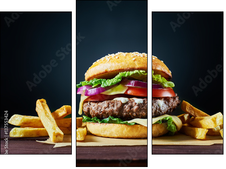 Craft beef burger and french fries on wooden table isolated on dark background. - Obraz trzyczęściowy, Tryptyk