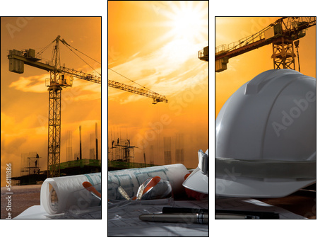 safety helmet and architect pland on wood table with sunset scen  - Obraz trzyczęściowy, Tryptyk