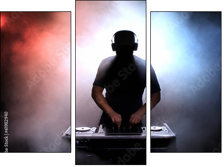 Disc jokey silhouette over illuminated smoke background  - Obraz trzyczęściowy, Tryptyk