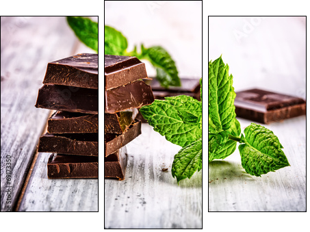 A few cubes of black chocolate with mint leaves on wooden table  - Obraz trzyczęściowy, Tryptyk
