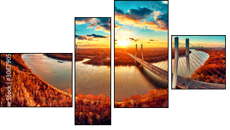 Beautiful panoramic aerial drone view to cable-stayed Siekierkowski Bridge over the Vistula river and Warsaw City skyscrapers, Poland in gold red autumn colors in November evening at sunset - Obraz czteroczęściowy, Fortyk