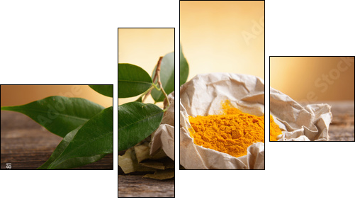 Tumeric powwder spice on wooden board with fresh leaves  - Obraz czteroczęściowy, Fortyk
