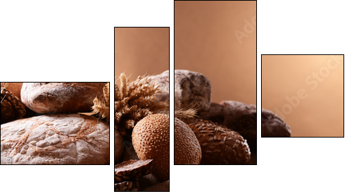 Different bread on table on brown background  - Obraz czteroczęściowy, Fortyk
