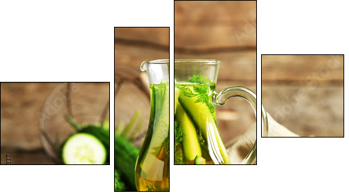 Glass ewer with fresh organic cucumber water on wooden table  - Obraz czteroczęściowy, Fortyk
