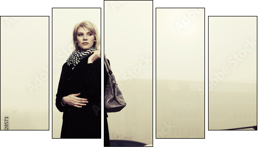 Young fashion woman with handbag on the foggy city street  - Obraz pięcioczęściowy, Pentaptyk