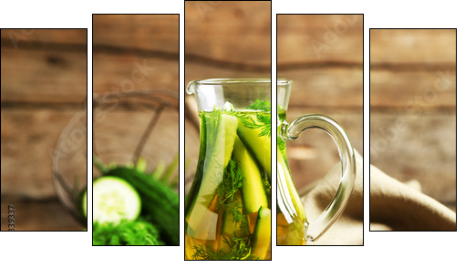 Glass ewer with fresh organic cucumber water on wooden table  - Obraz pięcioczęściowy, Pentaptyk