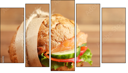 Sandwich with salmon on wooden background  - Obraz pięcioczęściowy, Pentaptyk